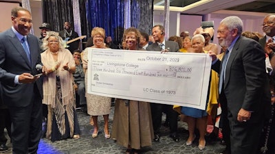 Livingstone College’s Class of 1973 raised more than $300,000 to support its alma mater and gifted an antique framed plate of the Price Building, which was presented to Livingstone President Dr. Anthony J. Davis.
