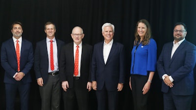 At the announcement of the new nursing education partnership (left to right) Wesley Trice, President of BAYADA Education, David Baiada, CEO of BAYADA Home Health Care; Mark Baiada, founder and Chairman of BAYADA Home Health Care, George E. Norcross, Chairman of Board of Cooper University Health Care, Dr. Merodie A. Hancock, President of TESU, and Dr. Anthony Mazzarelli, Co-CEO of Cooper University Health Care.