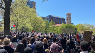 Student, faculty, and public protestors come together at Washington Square Park near New York University on April 23, the day after NYU leaders directed the NYPD to arrest over 130 protestors.