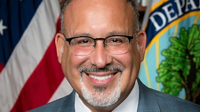 Dr. Miguel Cardona