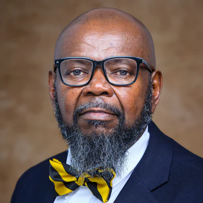 Dr. Dwayne L. Tut