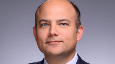 Brandon E. Roach