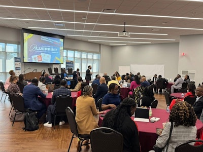 Ed Smith-Lewis, senior vice president for strategic partnerships at the United Negro College Fund facilitates a session at the H.E.L.F convening.