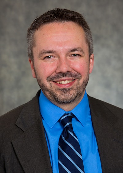 Dr. Travis Nelson